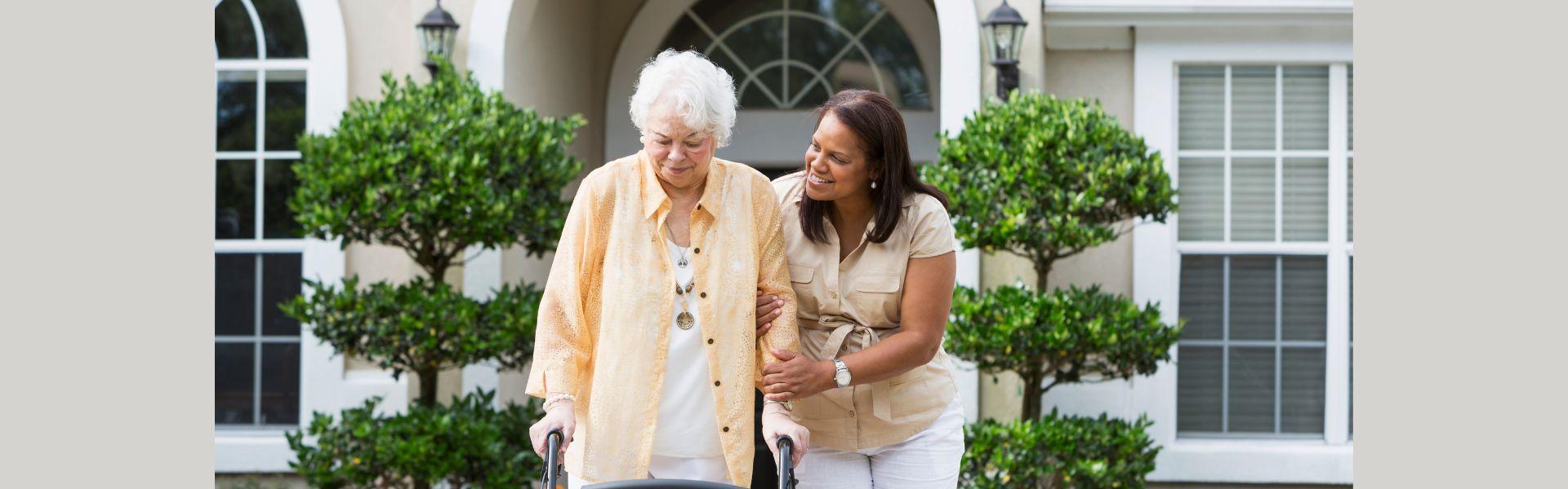 caregiver helps older woman