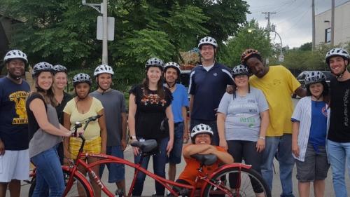 Members and volunteers buddy biking 