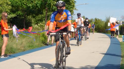 Tim crosses the finish line