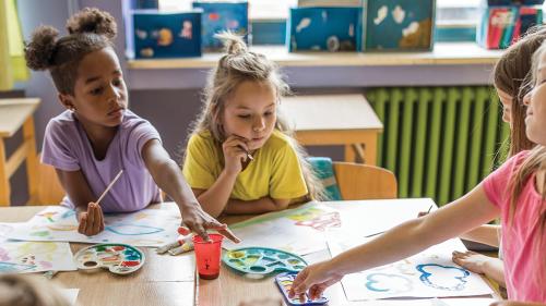 Children paint with watercolors