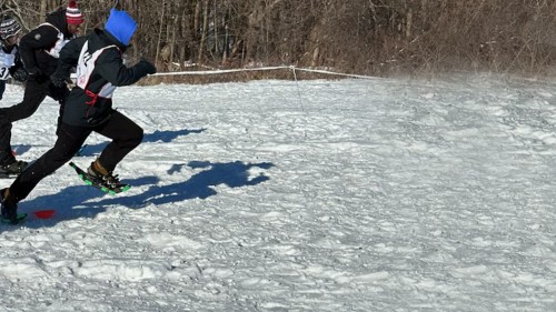 Envision Unlimited athletes compete in Special Olympics snow shoes races