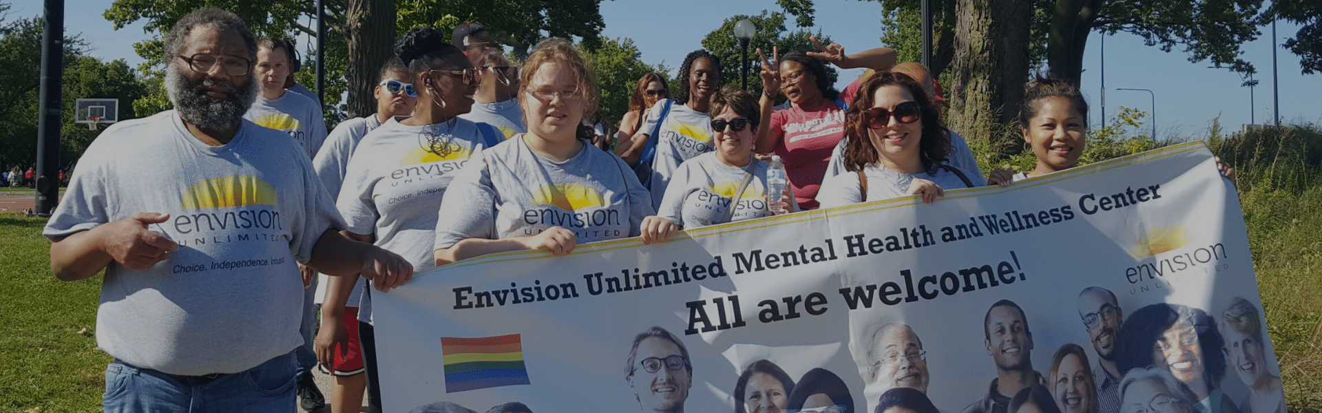 NAMI Walk photo featuring members holding a banner