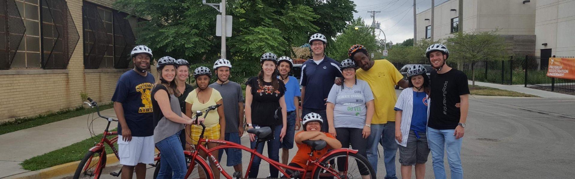 Members and volunteers buddy biking 