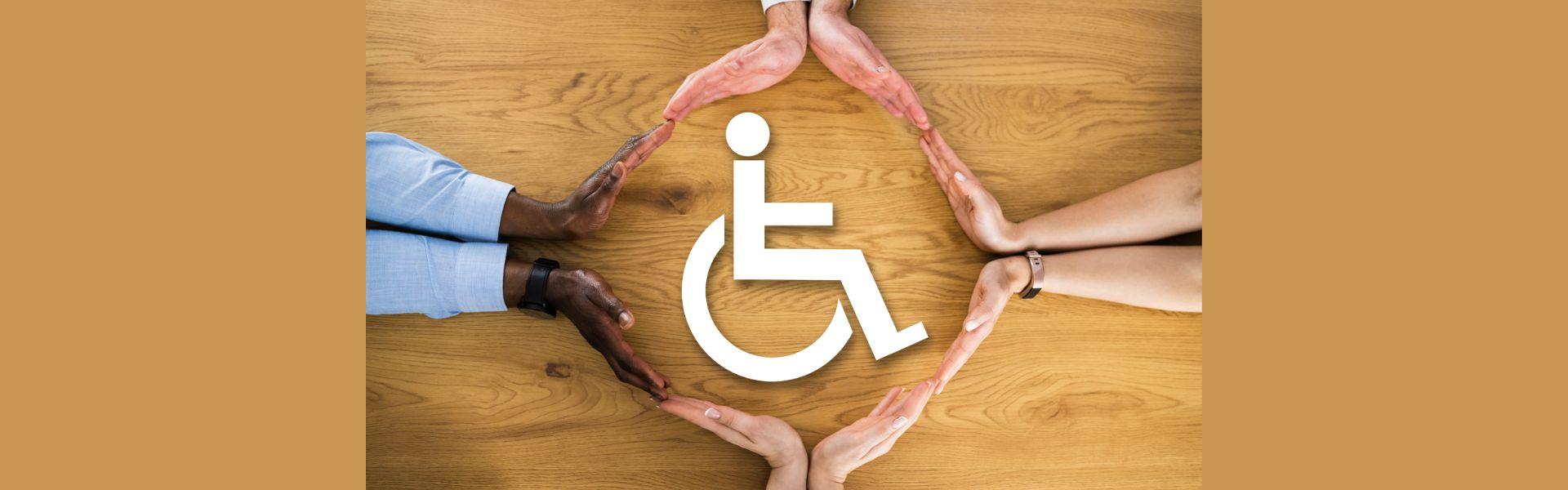 Accessibility symbol surrounded by racially diverse hands