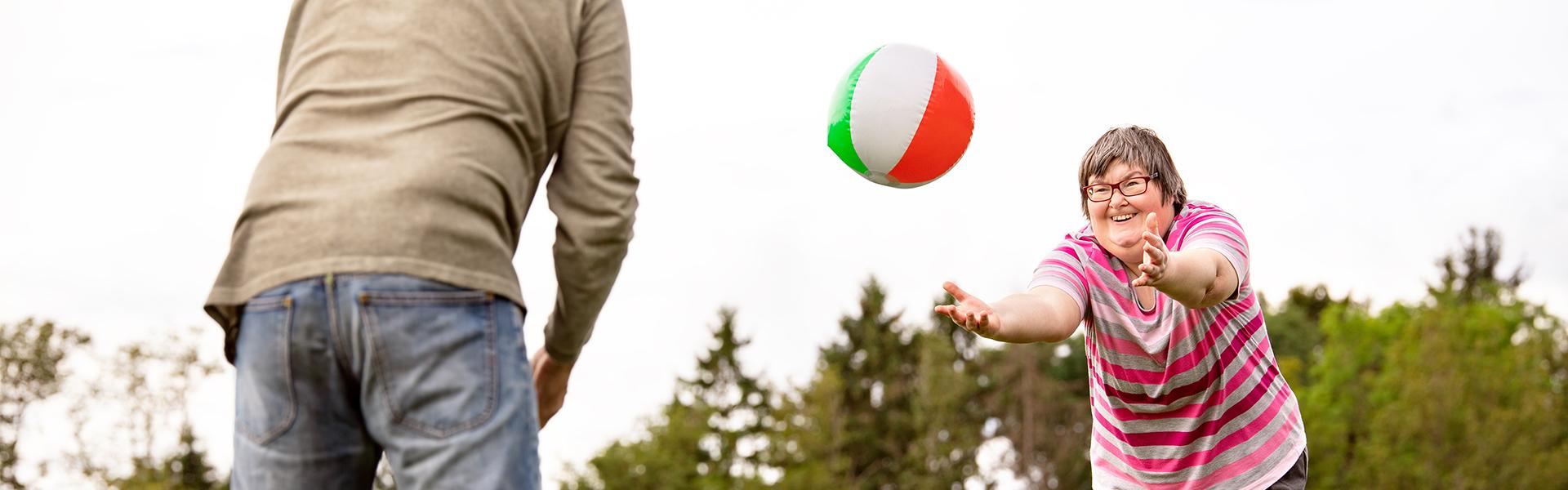 Playing toss with a beach ball