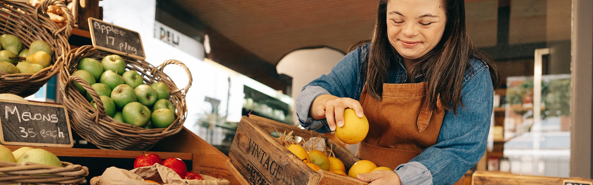 Young woman stocking lemons