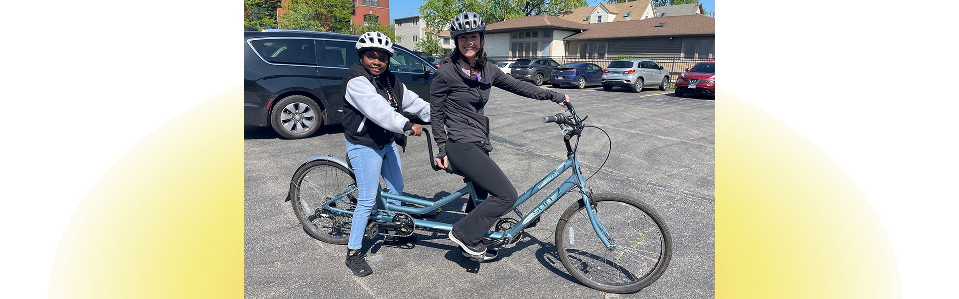 Jenny Achuthan and member on a tandem bike