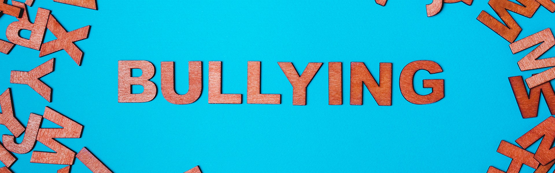 Bullying spelled out in wooden letters