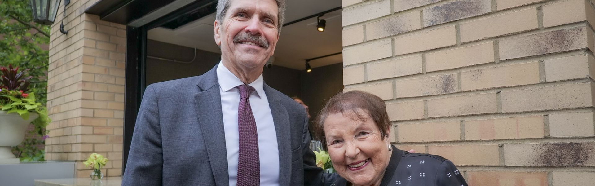 Envision CEO celebrates the retirement of a board member.