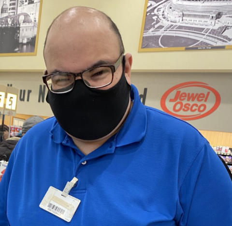Joel wearing his mask at work
