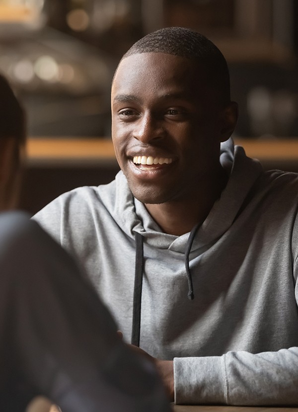 Certified Recovery Support Specialist talks with a peer.