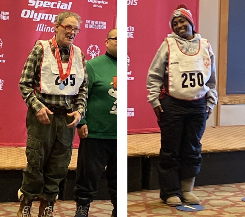 Envision Unlimited athlete are presented medals for winning Special Olympics snowshoe races