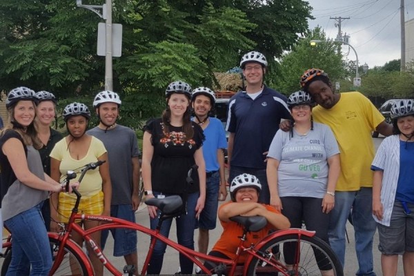 Members and volunteers buddy biking 